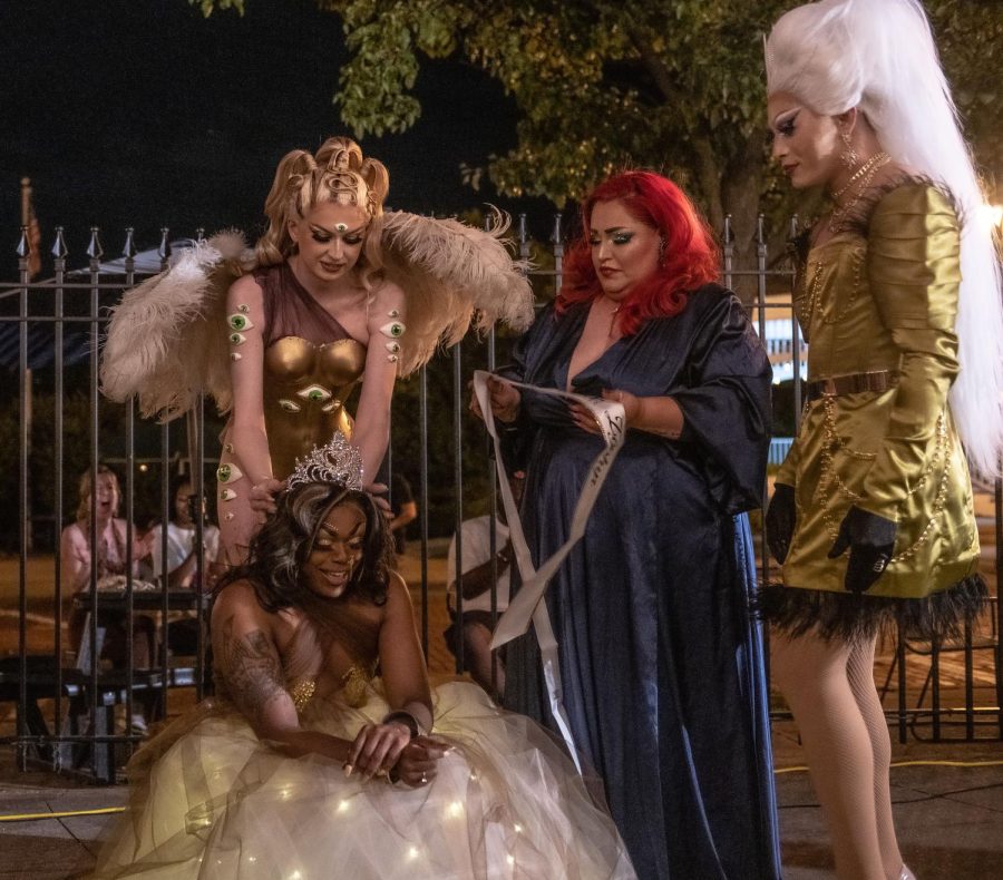 Onya Nerve being crowned Mx. Zephyr by judges Jade Uzumaki (left), Bella Sin (middle) and Agata Why (right) in the first Zephyr Drag Takeover at the Zephyr bar in downtown Kent on June 17, 2022.