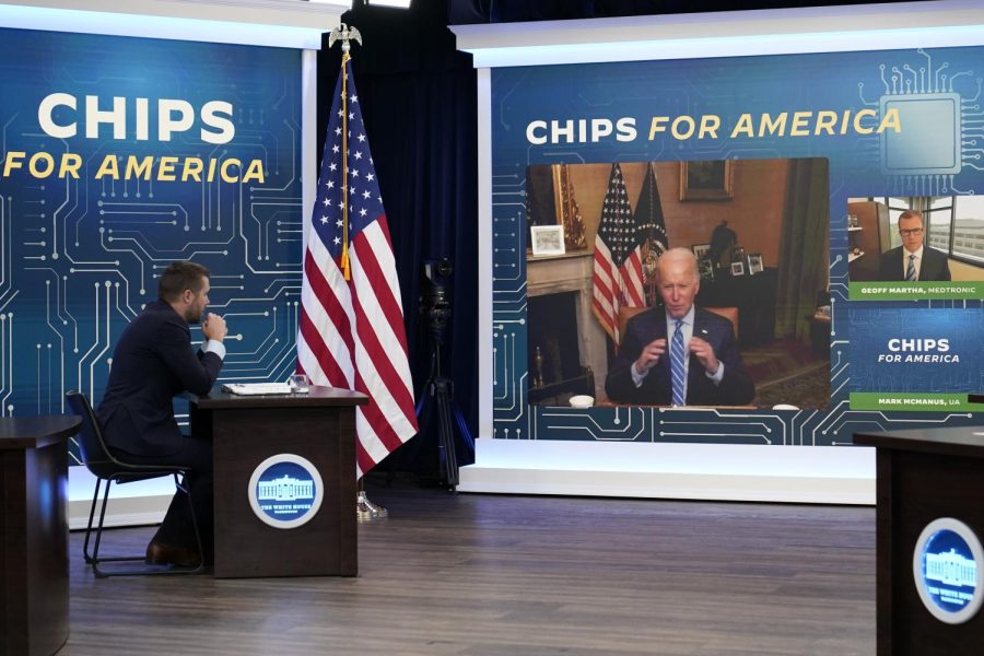 President Joe Biden speaks virtually during an event in the South Court Auditorium on the White House complex in Washington, Monday, July 25, 2022. Biden, who continues to recover from his coronavirus infection, spoke virtually with business executives and labor leaders to discuss the Chips Act, a proposal to bolster domestic manufacturing. (AP Photo/Susan Walsh)