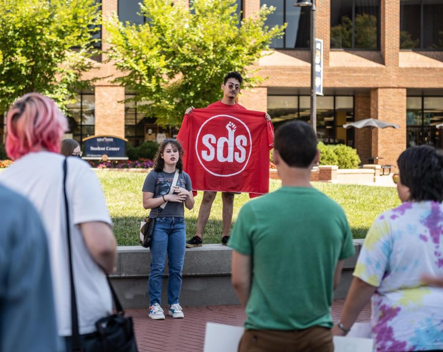 Senior sociology major Fionna Fisher (left) and sophomore political science major Christian Heller (right) lead chants and informed listeners of their stance on Roe v. Wade at Risman Plaza on Aug. 28, 2022.