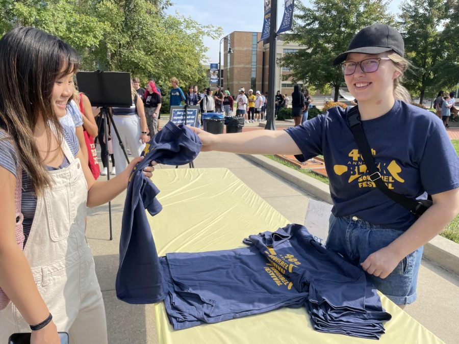 The first 800 students to come to the Black Squirrel Festival received free t-shirts from the Flash Activities Board
