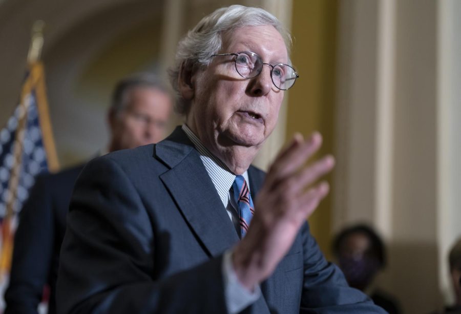 Senate Minority Leader Mitch McConnell, R-Ky., talks to reporters at the Capitol in Washington, Sept. 28, 2022. The Senate passed a short-term spending bill on Thursday that would avert a partial government shutdown when the current fiscal year ends at midnight Friday and provide another infusion of military and economic aid to Ukraine as it seeks to repel Russia's brutal invasion.