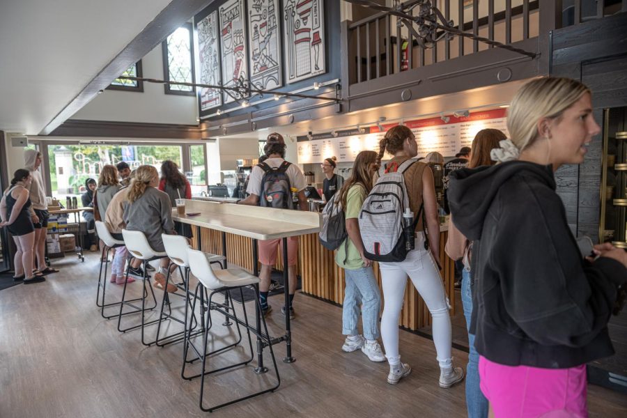 Customers mingle on the store's ground floor or wait in line for their orders to be taken.