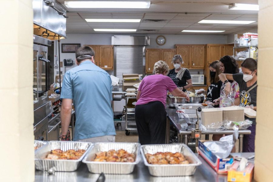 Volunteers preparing meals at Trinity Lutheran Church in Kent on September 10, 2022