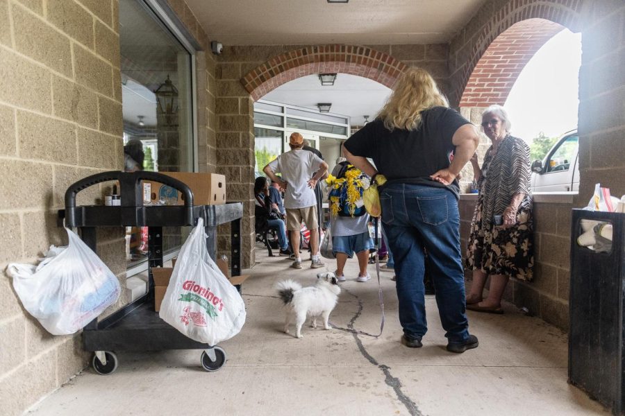 Guests of Faith Formation waiting to recieve food at Trinity Lutheran Church in Kent on September 10, 2022