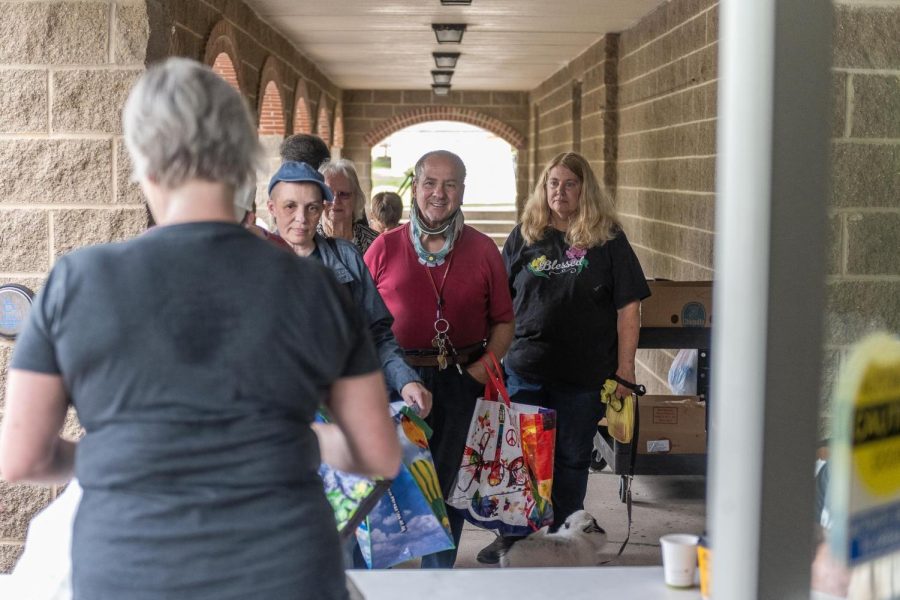 Guests of Faith Formation waiting to recieve food at Trinity Lutheran Church in Kent on September 10, 2022