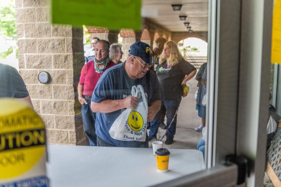 Bob Glass, guest of Faith Formation, recieving his meal at Trinity Lutheran Church in Kent on September 10, 2022