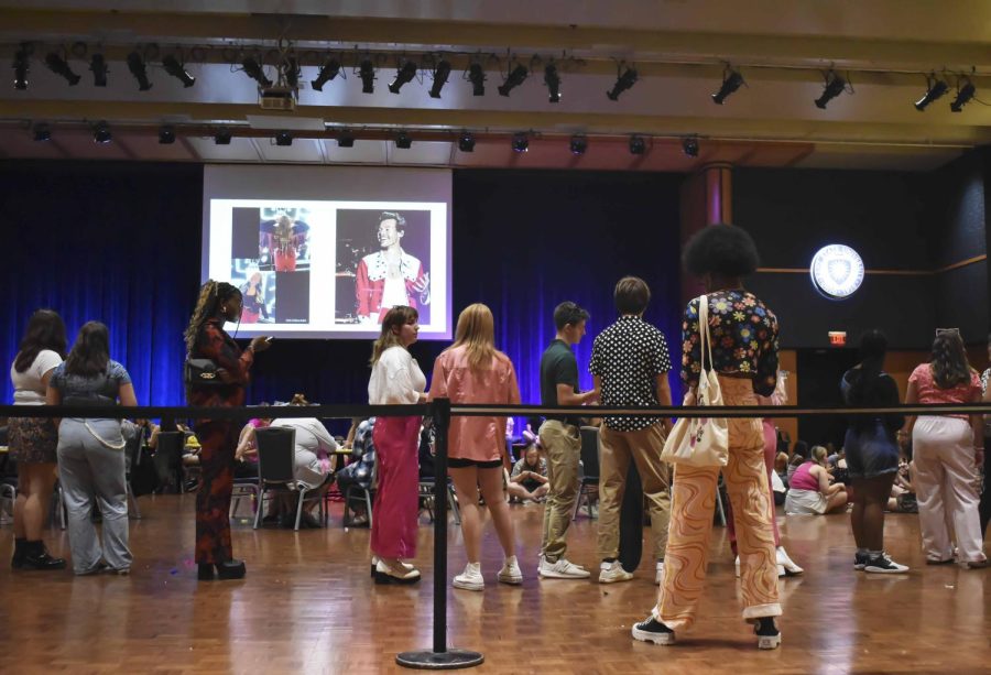 Students enjoy creating beaded jewelry, snacks, and music at the Harry Styles listening party on Sept. 10, 2022.