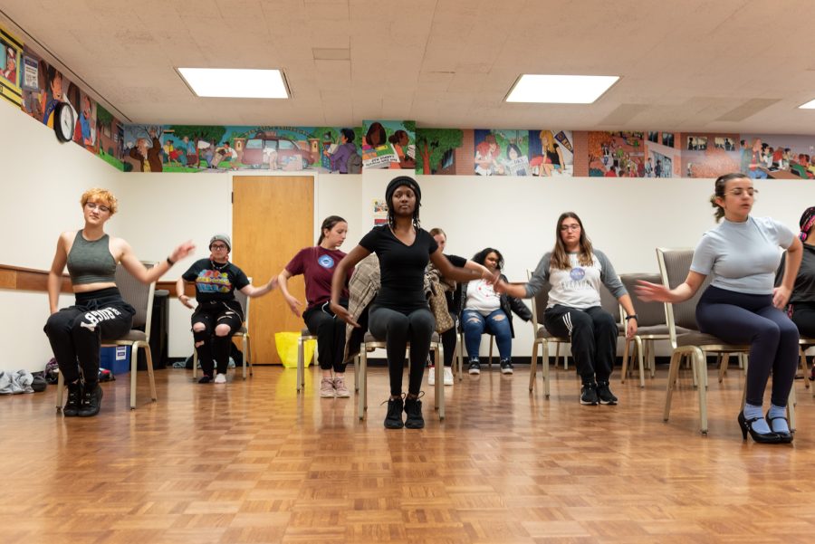 Some of the attendees focus on the dance moves given to them.