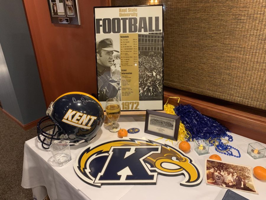 A table at the Kent State 1972 championship football team reunion at Laziza in downtown Kent featured the '72 football schedule and a helmet signed by then-coach Don James. The tangerines celebrated the team's appearance in the program's first bowl game that year.  