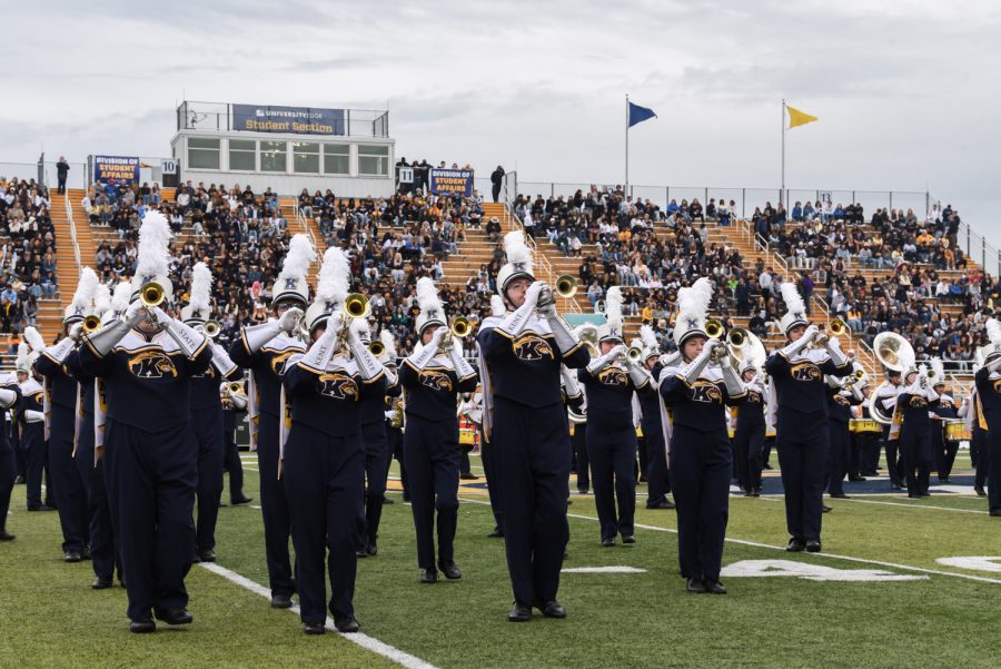 The Kent State Marching Golden Flashes play during halftime for the crowd. The band played a variety of Harry Styles' songs including "What Makes You Beautiful" and "Watermelon Sugar."