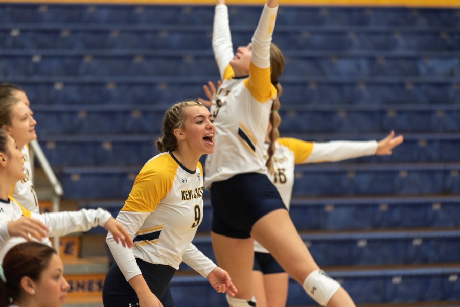 Senior outside hitter Taylor Heberle cheers her team on Oct. 29. Heberle kept the positivity going as she encouraged the players.