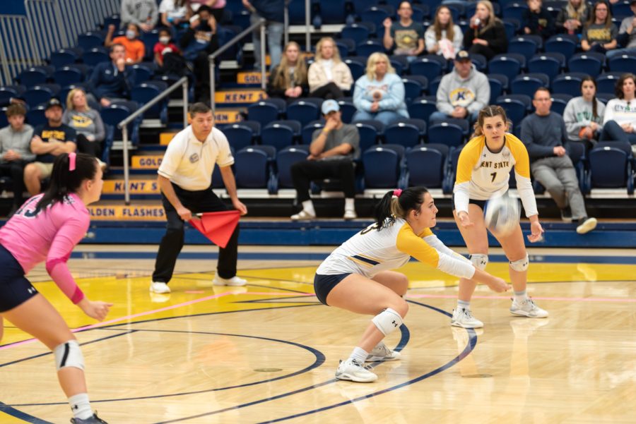 Golden Flash player Bryn Roberts bumps the volleyball after a serve goes over from the Western Michigan team. Kent's team fell short 3-1.