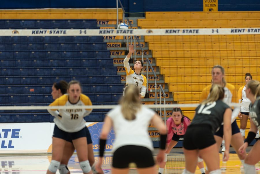 Bryn Roberts serves the ball to the Western Michigan team. The ladies kept the fight going, but lost to their opponents.