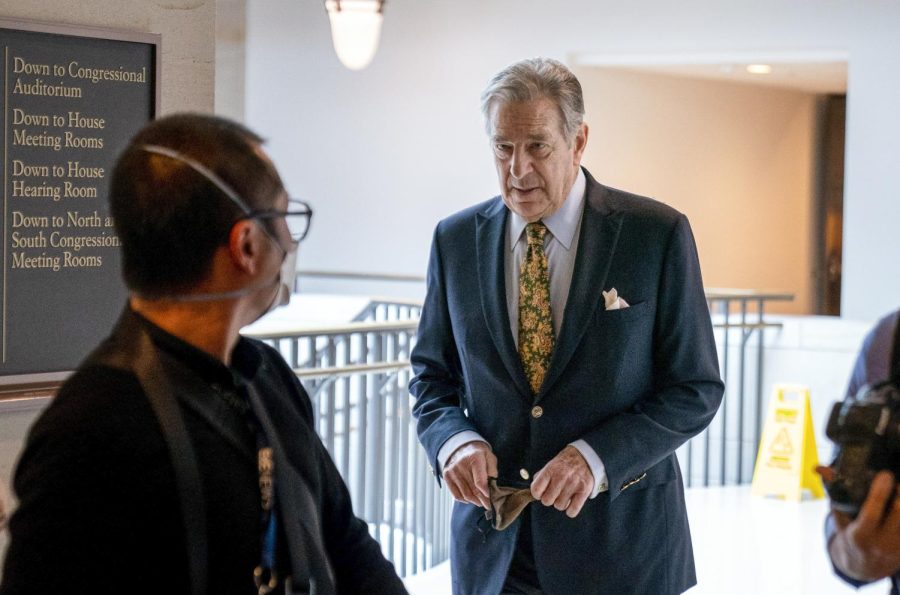 Paul Pelosi (right), the husband of House Speaker Nancy Pelosi, was attacked at the couple's home in San Francisco early on October 28. Pelosi is pictured here in Washington, DC, on March 17.