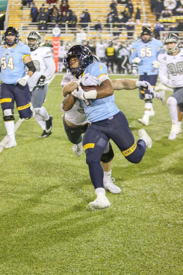 Kent State junior running back Marquez Cooper runs for a touchdown against Eastern Michigan during the final home game on Nov. 16, 2022.