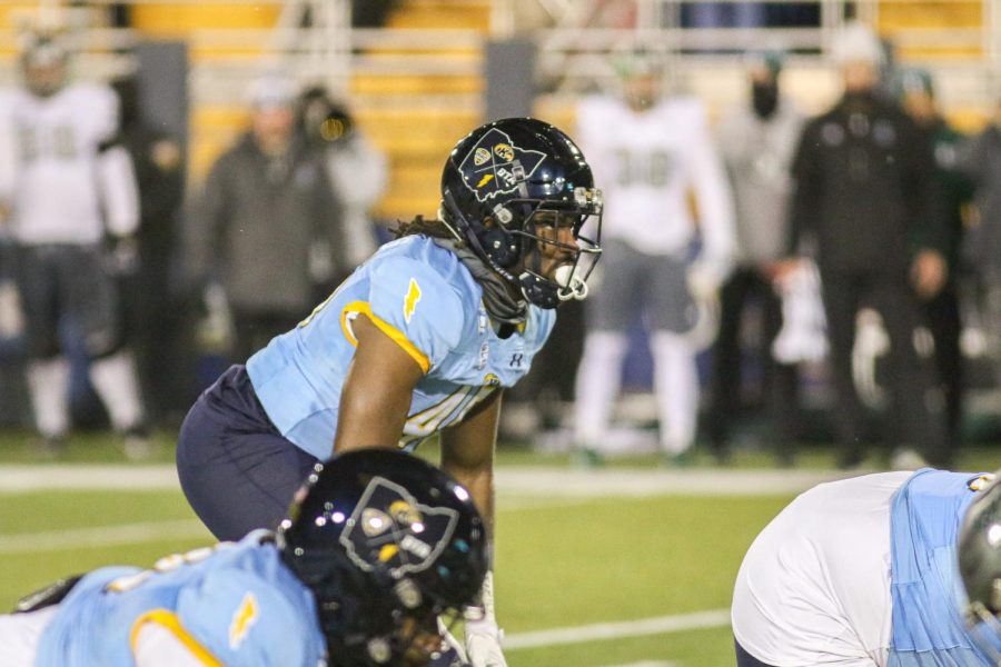 Kent State junior linebacker Khali Saunders, gets into position for a play against Eastern Michigan during the game on November 16, 2022.