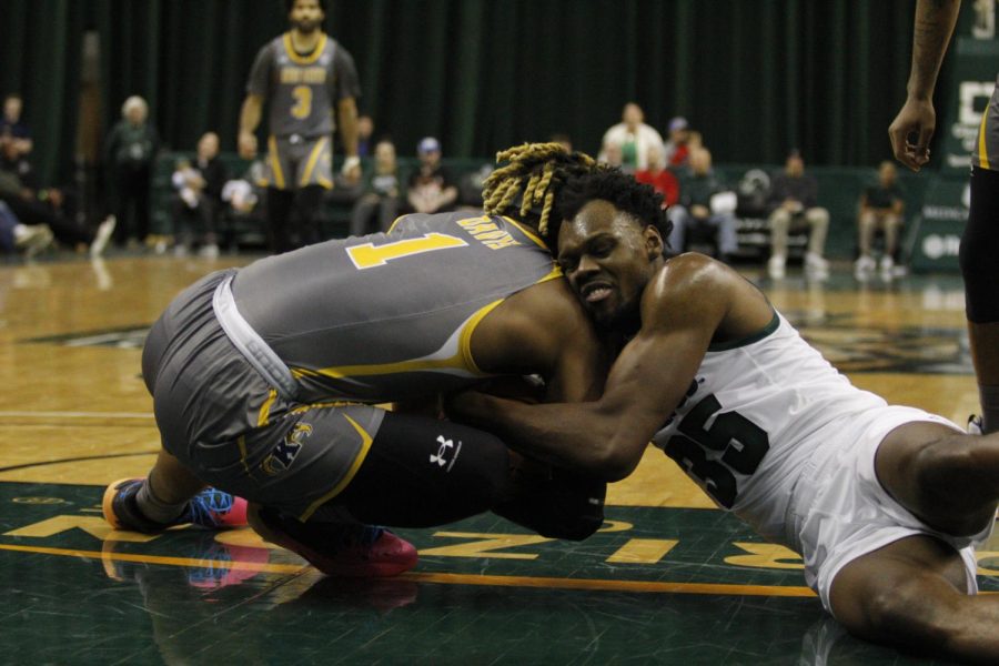 VonCameron Davis fights for the ball in Kent State's 67-58 win over Cleveland State on Saturday afternoon.