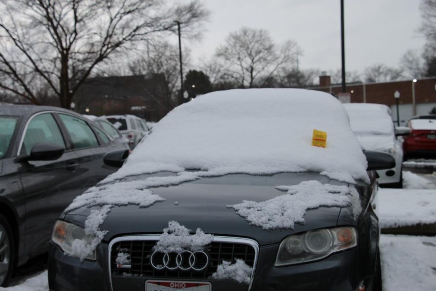 Kent State parking services stays on top of their job by still providing tickets, even through inches of snow on Jan. 25, 2023. 