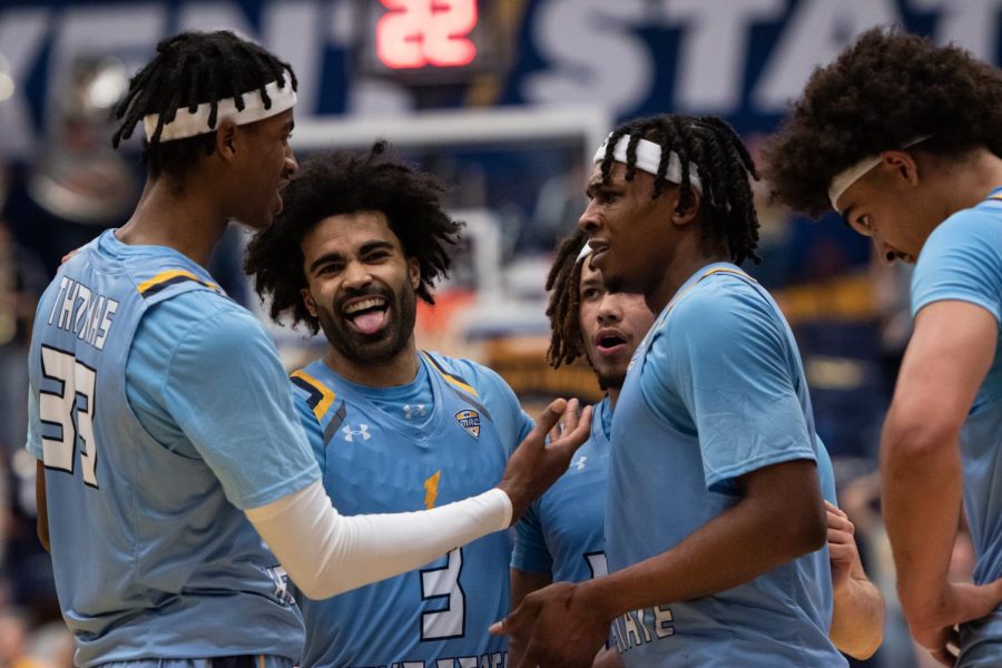 The Kent State men's basketball team celebrates as the game enters its final seconds with the Flashes in the lead Feb. 28, 2023. The Flashes would win the game against Ohio University 82-75.