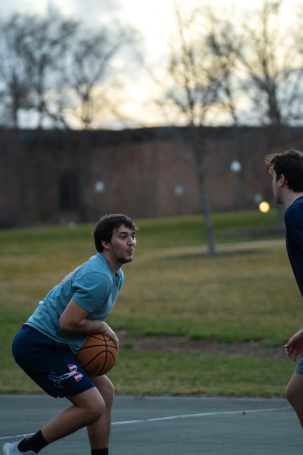 Logan Katzman, sophomore, plays offensively against fellow sophomore Austin Schmidt Feb. 23, 2023.