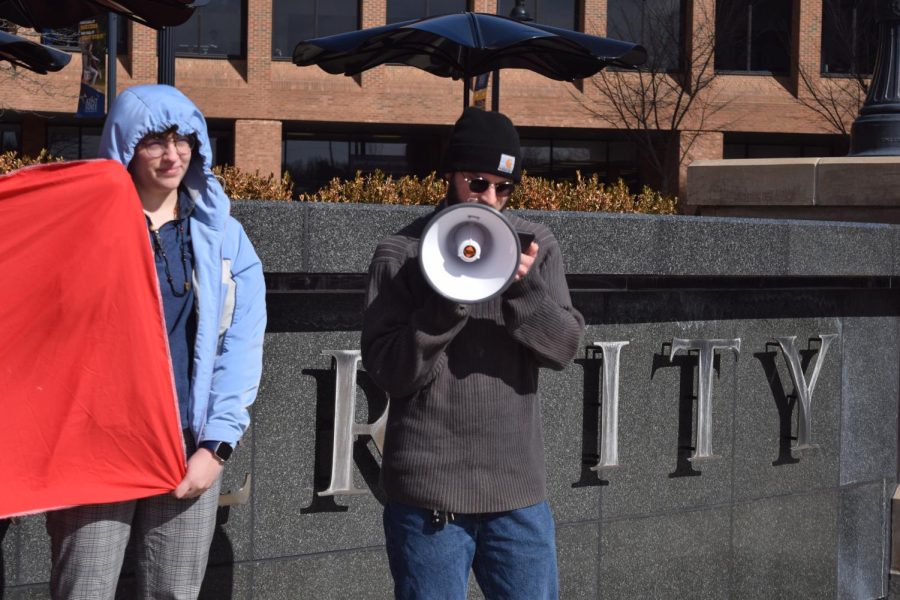 Lucas Frantianne speaks at the protest with the Students for a Democratic Society, chanting sayings like "education is a right not just for the rich and white."