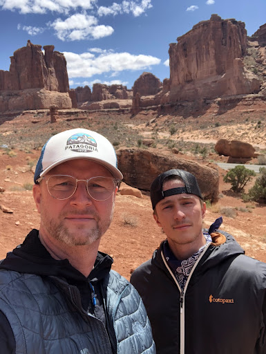 Coach Starkey poses with his son, Drew, as they hike through Arches National Park in Utah on April 17, 2021. Todd and Drew enjoy riding their motorcycles and hiking through National Parks.
