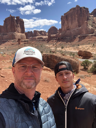 Coach Starkey poses with his son, Drew, as they hike through Arches National Park in Utah on April 17, 2021. Todd and Drew enjoy riding their motorcycles and hiking through National Parks.