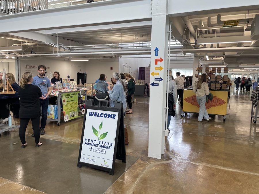 Members of the Kent community check out vendors and their tables at the Kent State Farmers' Market March 21, 2023.