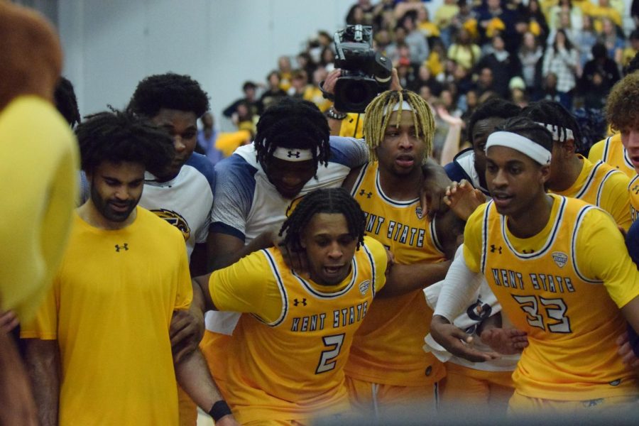 Kent State University's men's basketball team celebrates its win against the University of Akron on March 3, 2023.