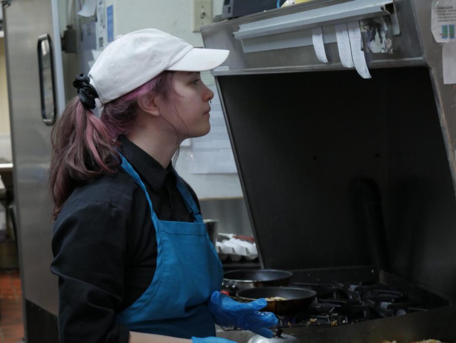 Carrie Carpenter preparing orders during her shift at the Wild Goats Cafe, located at 319 W Main St, Kent, OH 44240.