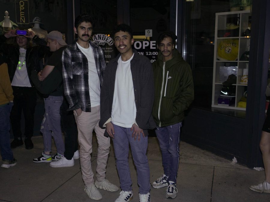 Sultan Alyami (left), Hadi Alajmi (center) and Mans Almup (right) waiting in line at Barflyy during Kent's Fake Paddy's Day Celebration Mar. 11.