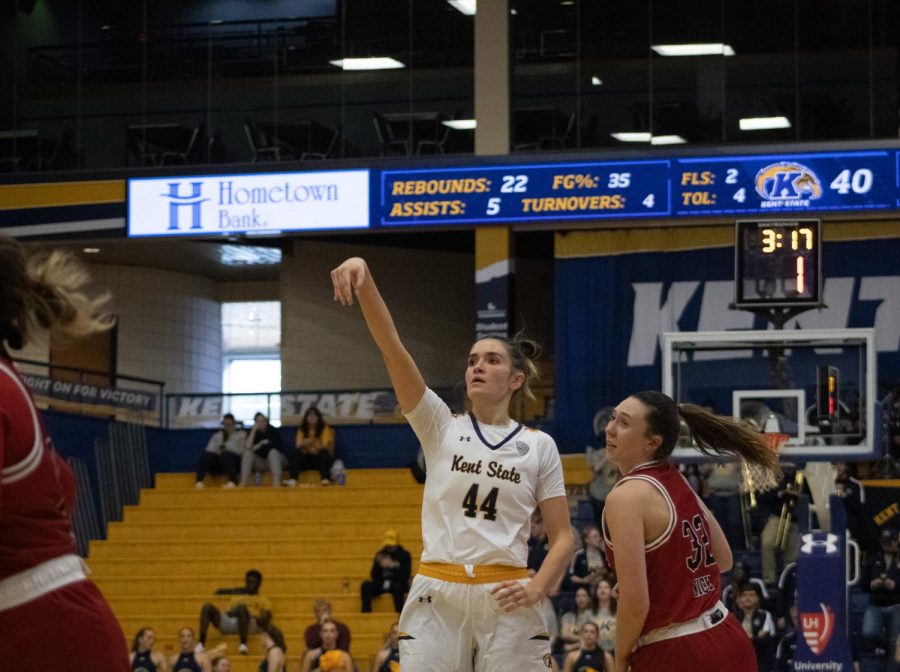 Graduate student forward Lindsey Thall shoots a three pointer in the women's basketball game against Northern Illinois University March 4, 2023.