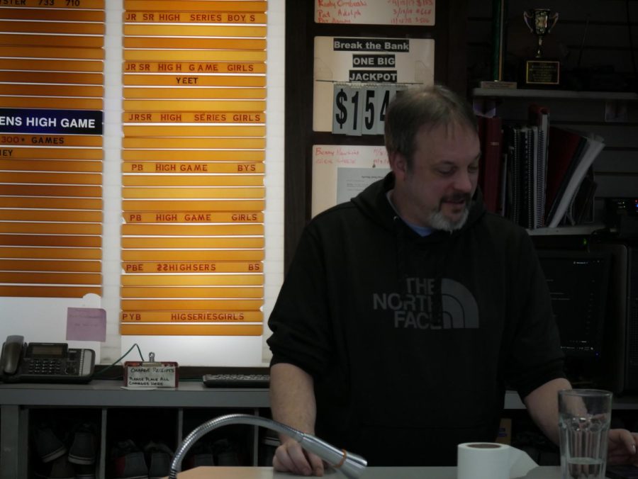 Ed Miner working behind the counter at Kent Lanes, located at 1524 S Water St, Kent, OH 44240.