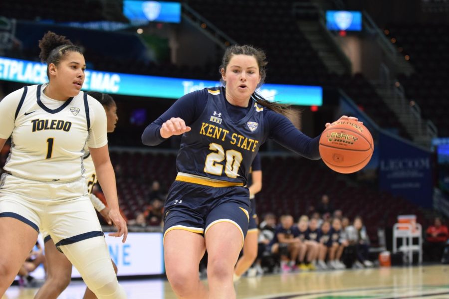 Kent State University senior Clare Kelly dribbles down the court in the semifinal game against The University of Toledo on March 10, 2023. 