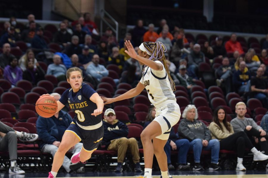 Kent State University Junior Casey Santoro heads for the hoop in the semifinal game of the MAC Tournament against The Toledo Rockets.