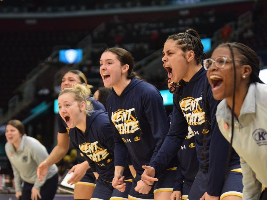 Kent State University basketball players cheer from the bench during the semifinal game against The University of Toledo on March 10, 2023. The close game ended in a loss for The Flashes with a final score of 68-58.