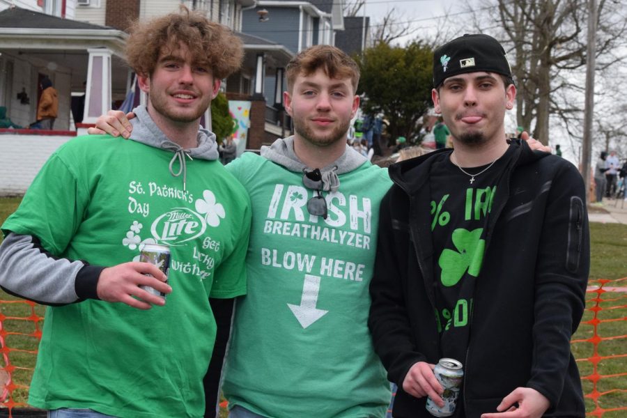 Kent State Students stand outside Phi Delta's fraternity house, trying to stay warm and have a good time during Fake Paddy's Day parties.