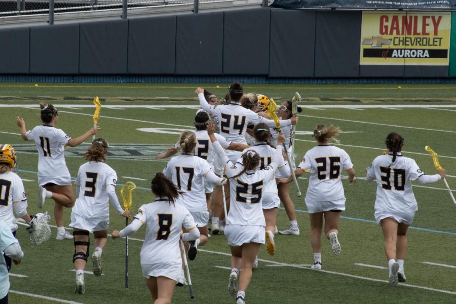 Kent State Golden Flashes celebrate their win over Central Michigan Chippewas April 22, 2023.