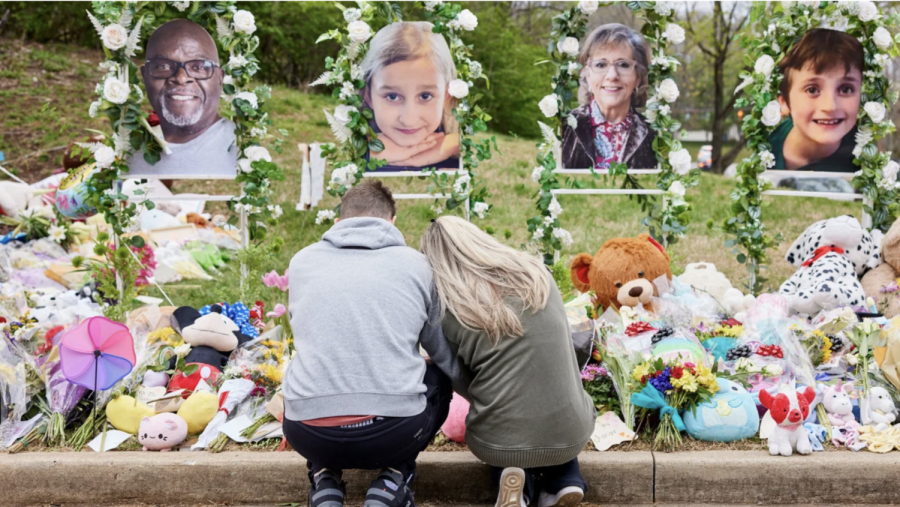 A couple prays at the memorial for the victims of the shooting at the Covenant School in Nashville.
(Johnnie Izquierdo/The Washington Post/Getty Images)