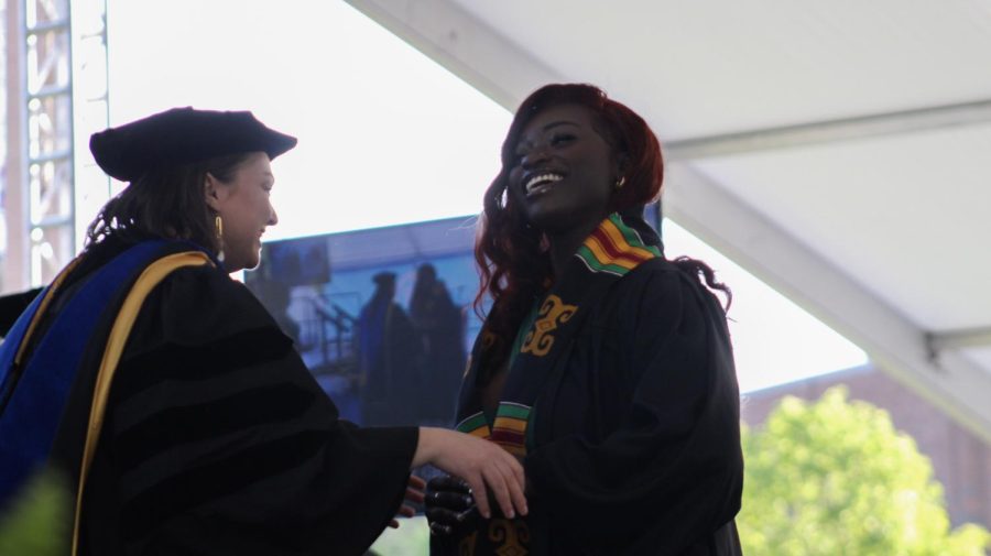 A graduate is given their stole at this year's Karamu Ya Wahitimu pre-commencement ceremony on May 10, 2023.