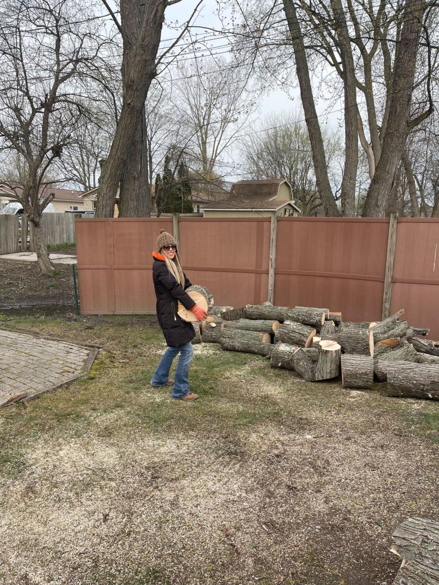 Chrissy LaFleur, who graduated from Kent State in 2007, helps run a landscaping business with her husband.