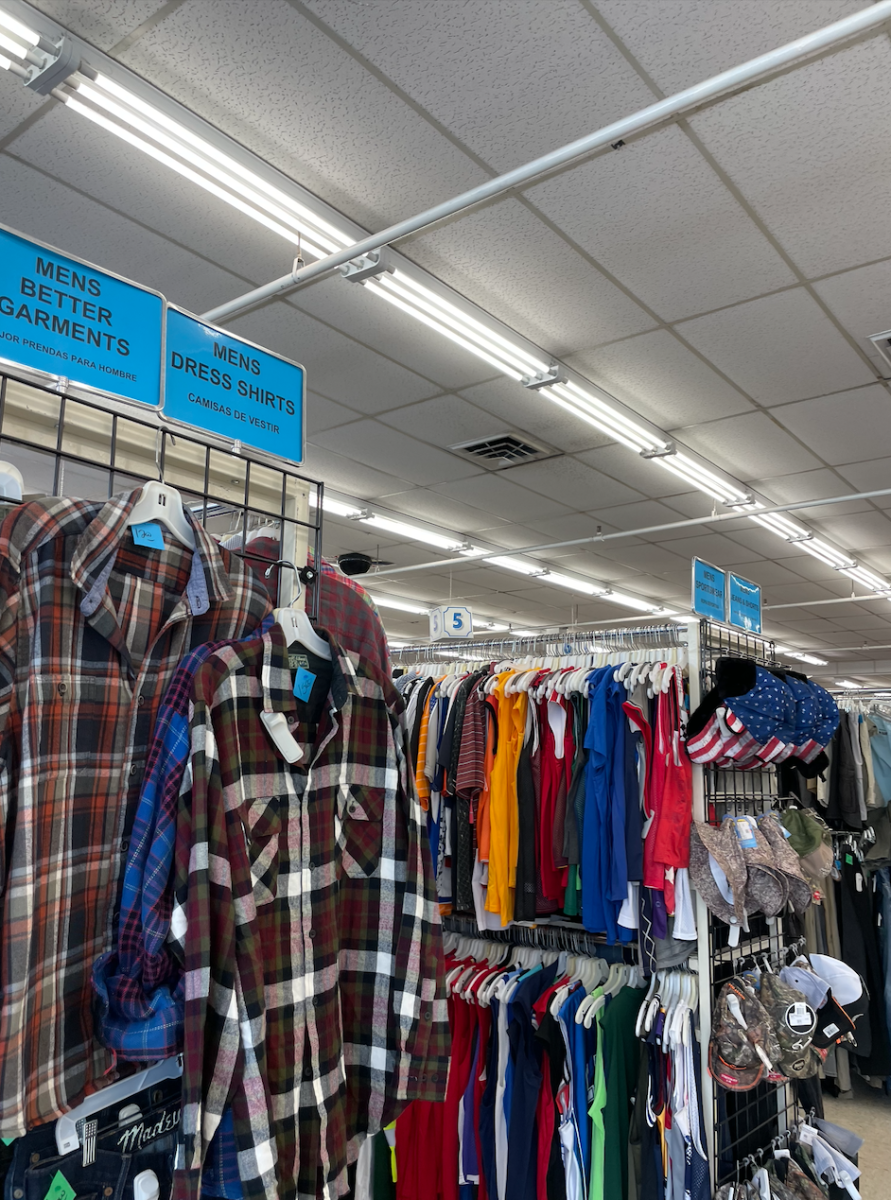 Racks of clothes and apparel at Village Discount Outlet located in Cuyahoga Falls, Ohio, on Aug. 24, 2023.