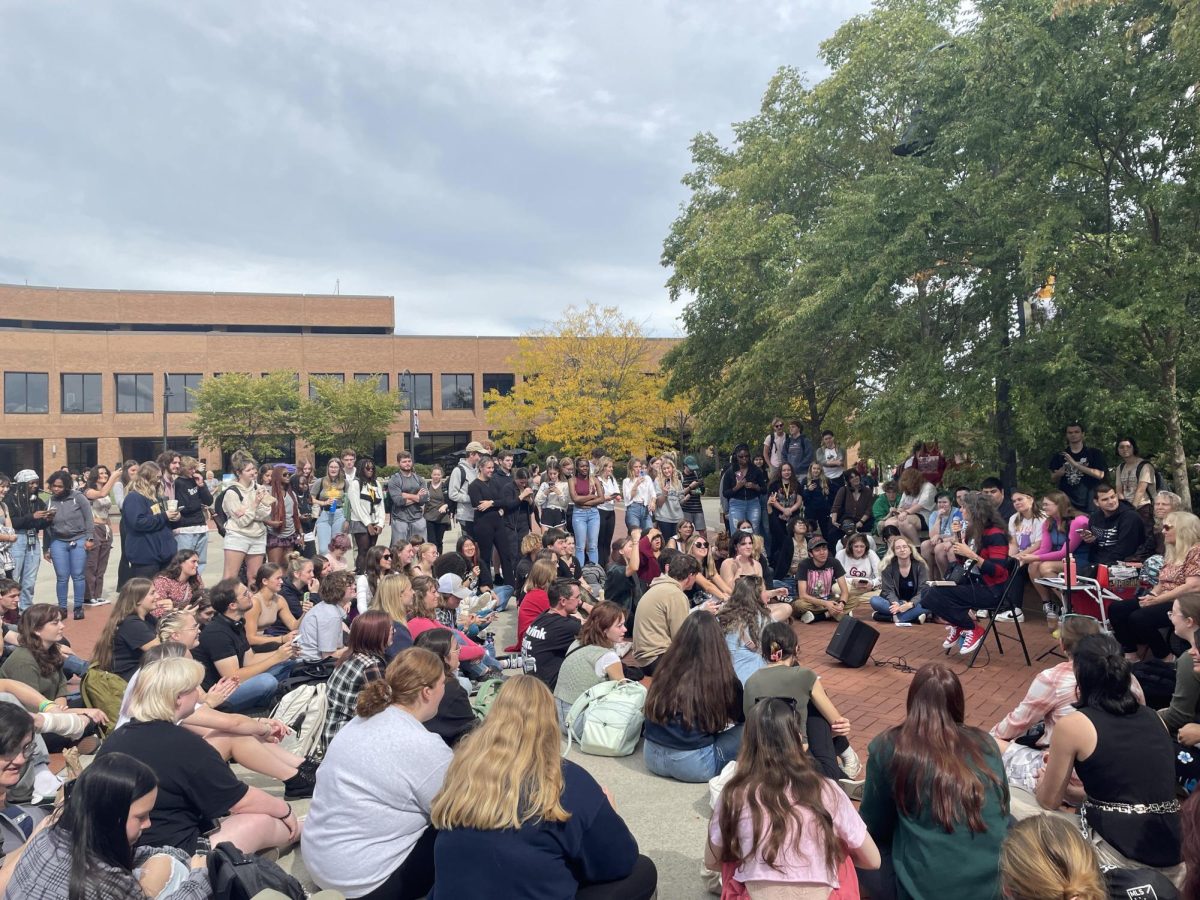 Cindy Smock, the Tiktok campus preacher known as "Sister Cindy", preaches to a group of students on Risman Plaza Sept. 25, 2023