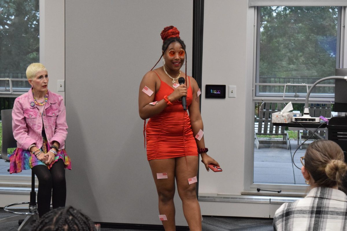 Kent State Student Jaelyn Brown dresses up as a "red flag" from one of her favorite banned books for the Read-In on Sept. 23, 2024.