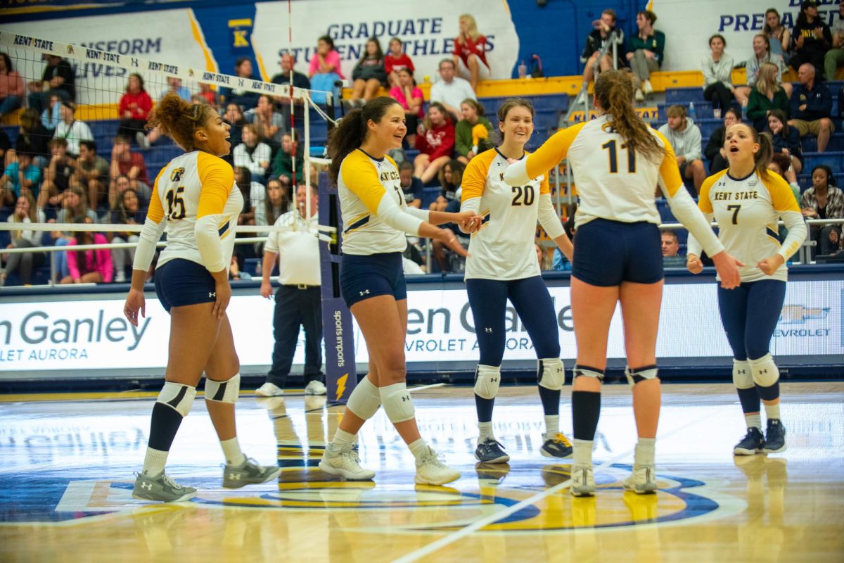 The Kent State Women's Volleyball team celebrating a point during their match against Youngstown State on Sept. 15th, 2023. 