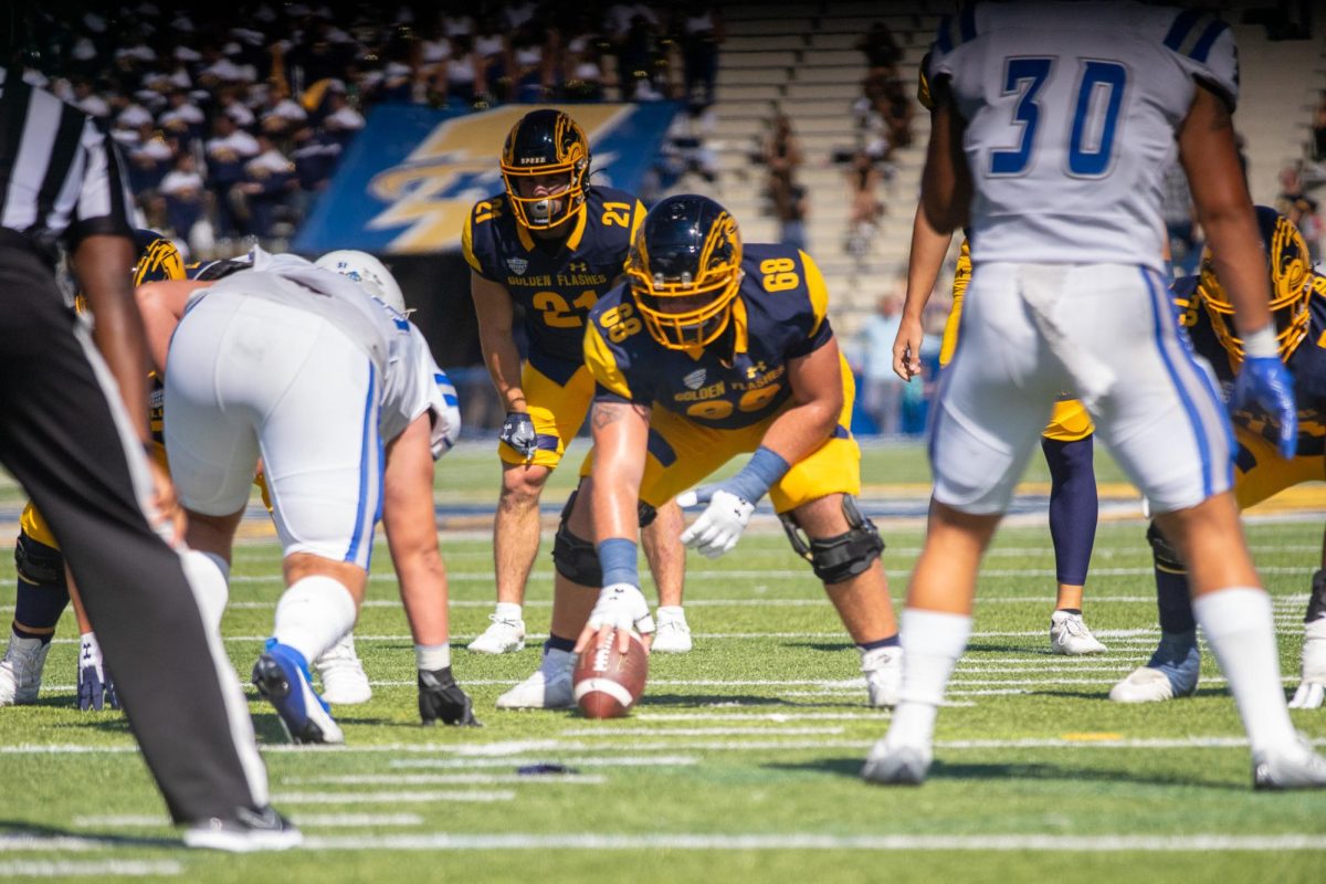 Kent State offensive line getting ready for the snap to start their next drive in the game against Central Connecticut on Sept. 16, 2023.