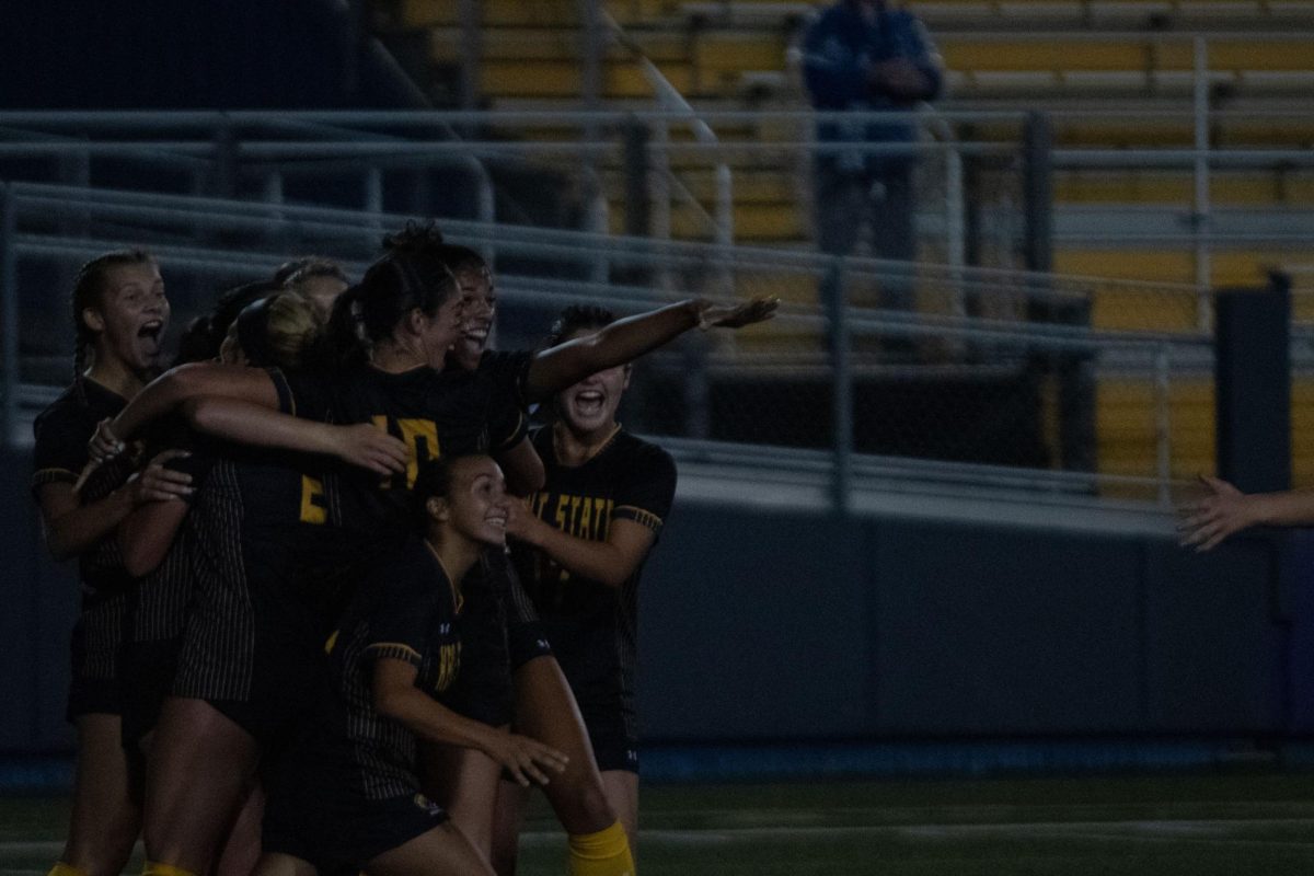 The Kent women's soccer team celebrate after team member Abby Breitschuh scored the winning goal with just 48 seconds left on the clock on Sept. 28th. The team won 2-1 against Eastern Michigan. 