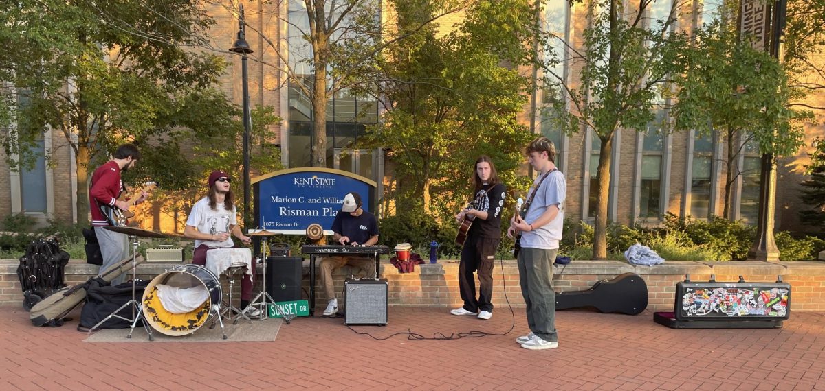 Sunset Drive preforming outside of the library