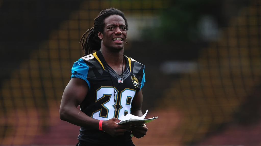 Sergio Brown helps coach children in 2015 in London.