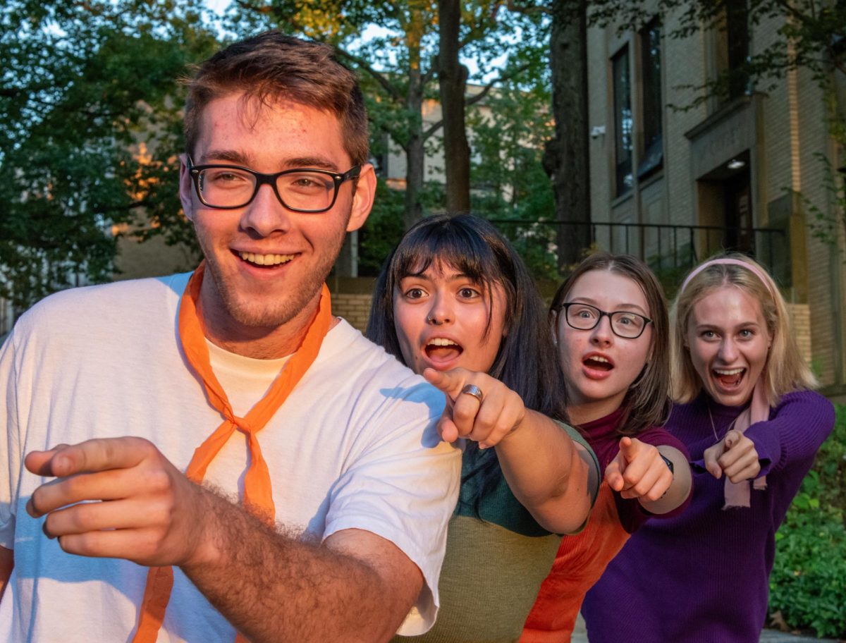 Members of the KentWired editorial board dressed as characters from Scooby Doo! to celebrate 100 years of Warner Bros.